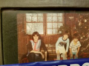 Christmas 1983 in Chicago with my brothers John and Taylor. Me in my Heavy Metal shirt.